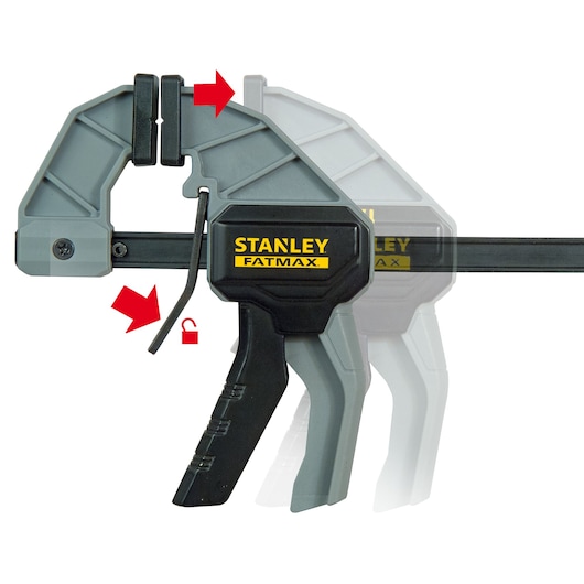 STANLEY FMHT0-83232 serre-joint à barre à changement rapide noir et gris, flèches rouges sur le mécanisme de déverrouillage, vue latérale.