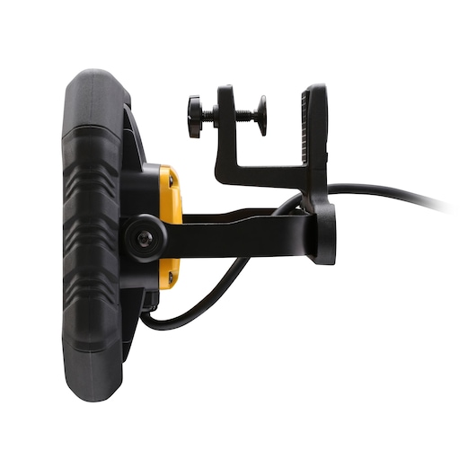 Lampe de travail STANLEY FMHT81507-1 vue de côté avec poignée noire, boîtier jaune et pince de fixation.