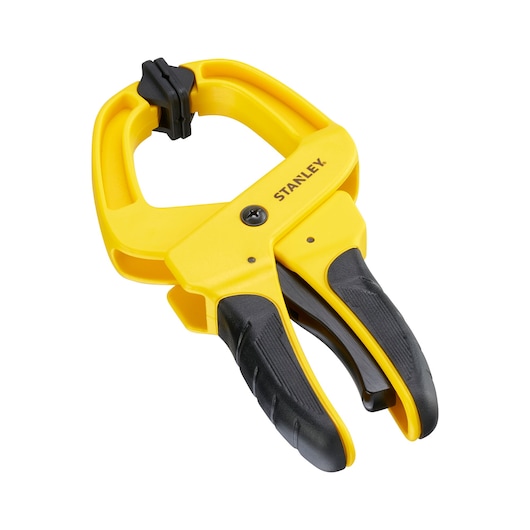 STANLEY STHT0-83199 gele en zwarte veerklem, vooraanzicht, met ergonomisch handvat, op witte achtergrond.