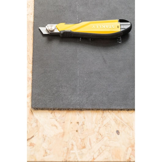 STANLEY STHT10270-0 stanleymes op plaatmateriaal, bovenaanzicht, gele en zwarte handgreep.