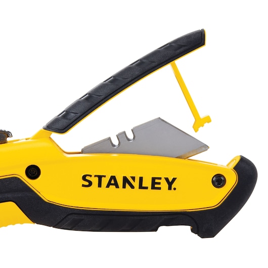 STANLEY STHT10479-0 couteau utilitaire jaune photographié de côté droit avec lame visible.