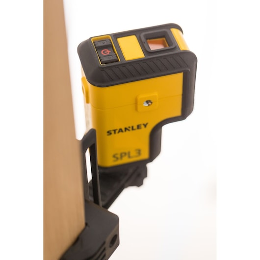 STANLEY STHT77503-1 gele SPL3 laserwaterpas close-up met zichtbare knoppen.